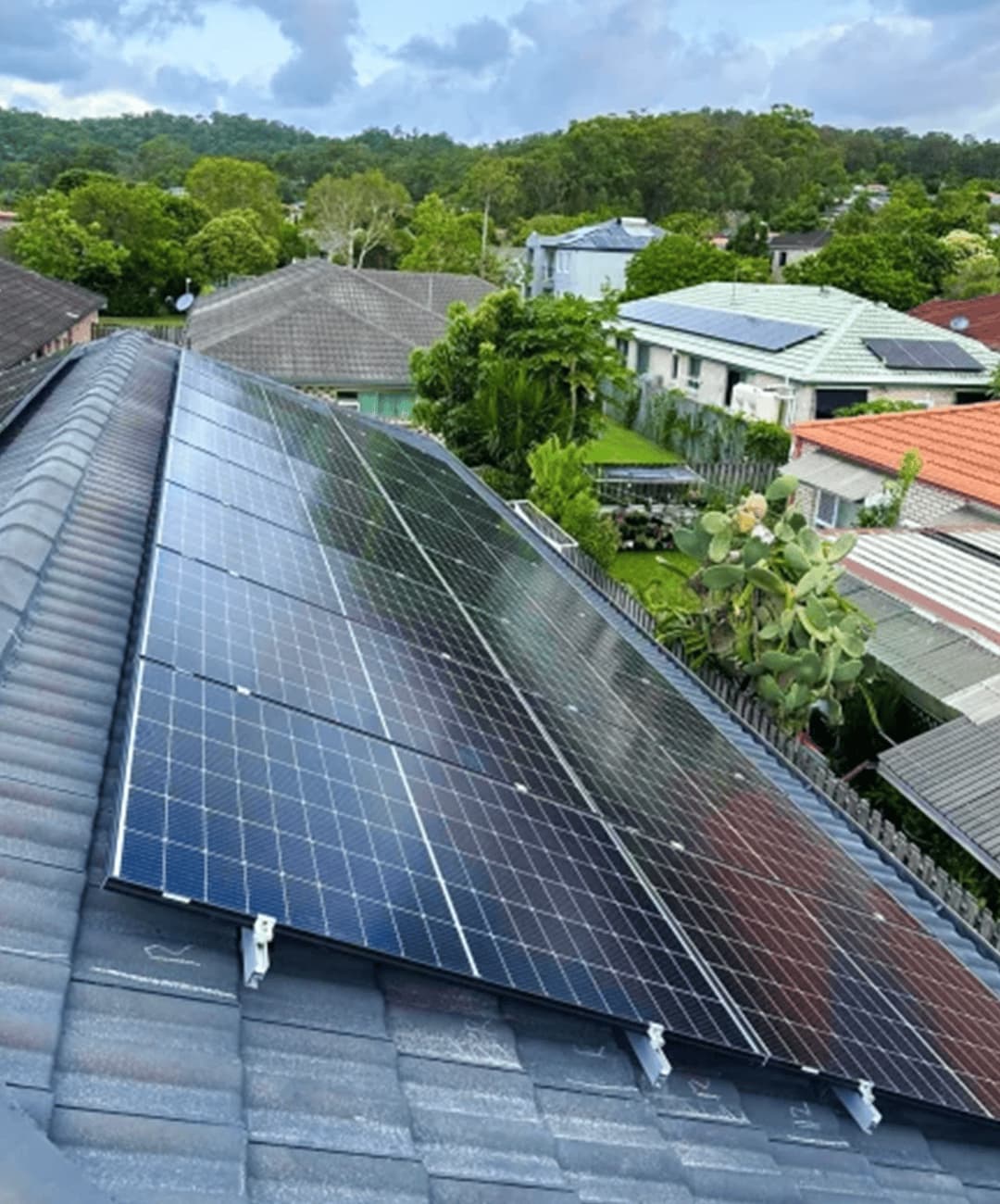 LCMB installer fitting solar panels to a roof